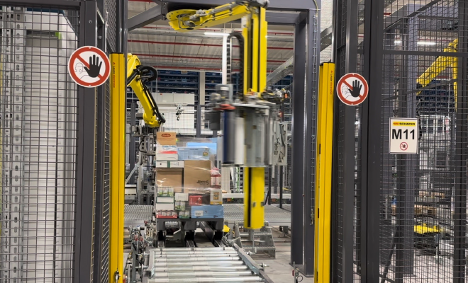Robot som plastar pall